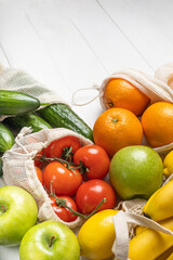 Vegetables and fruits in eco-friendly bags