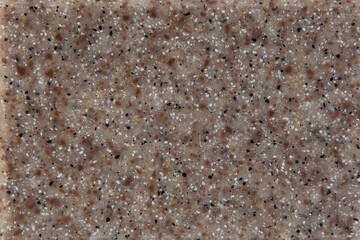 Texture of decorative artificial acrylic stone. Stone sample for bathroom, kitchen countertops furniture. Stone texture for modern interior design.