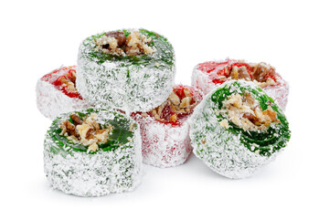 Green Turkish Delight with nuts on powdered sugar isolated on white