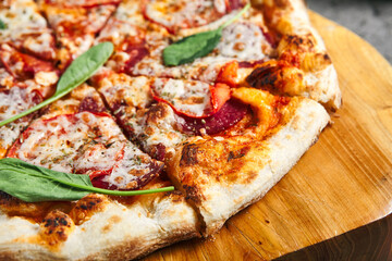 Pepperoni Pizza on Wooden Trat with Textile Napkin