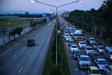 traffic jam in evening long exposture . blur car and air plane transportation