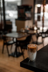 glass of coffee with milk on the table