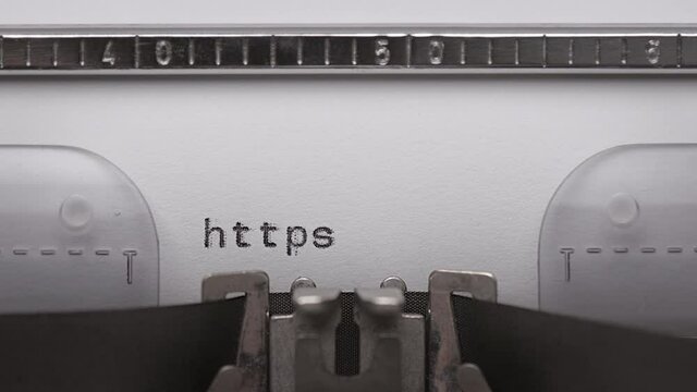 Typing text http www on vintage manual typewriter. Close up of writes word on white paper. Shot in macro 4K resolution. Internet wide web.