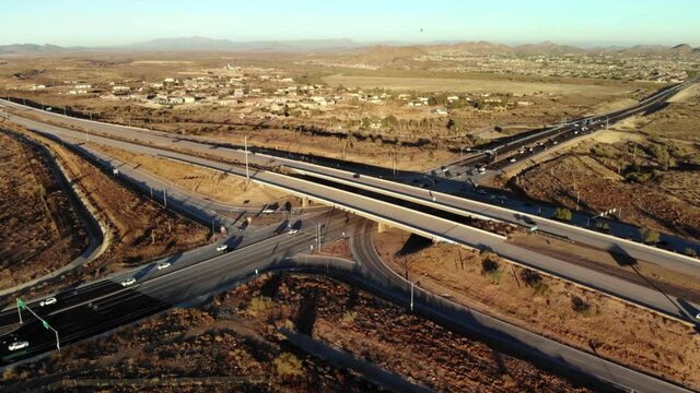 Low altitude desert view of the Hwy. 303 interchange with Happy Valley Rd. Peoria Arizona