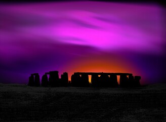 Fototapeta premium stylized megalith silhouetted against dramatic evening sky