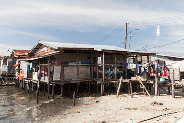 Old wooden houses and footbridges on stilts