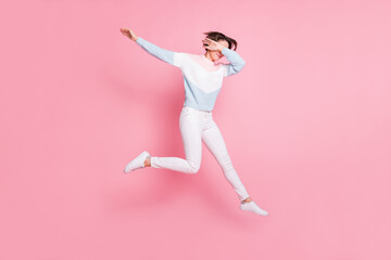 Fototapeta na wymiar Full length photo portrait of woman dabbing jumping up isolated on pastel pink colored background