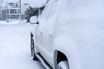 a truck stuck in snow storm in the winter