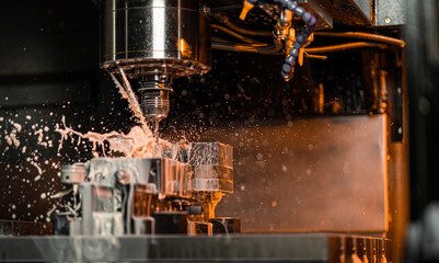 CNC machining centre drilling steel and using metal working fluid as coolant