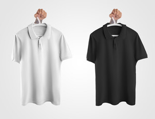 Mockup of white, black polo hanging on a hanger in hand, clothes for men, isolated on background.