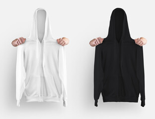 Template of a white, black sweatshirt with a hood, zipper closure, pocket, holding clothes with hands, for design presentation.