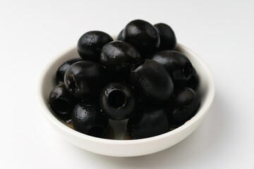 Black olives on a white background