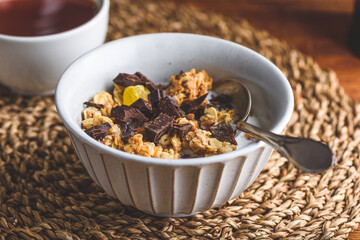 Breakfast Bowl of Granola with Dried Fruits and Crushed Chocolate