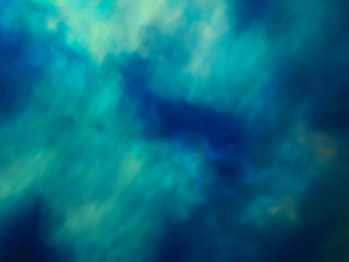 Blurred bright blue and turquoise universe background Northern or polar lights.