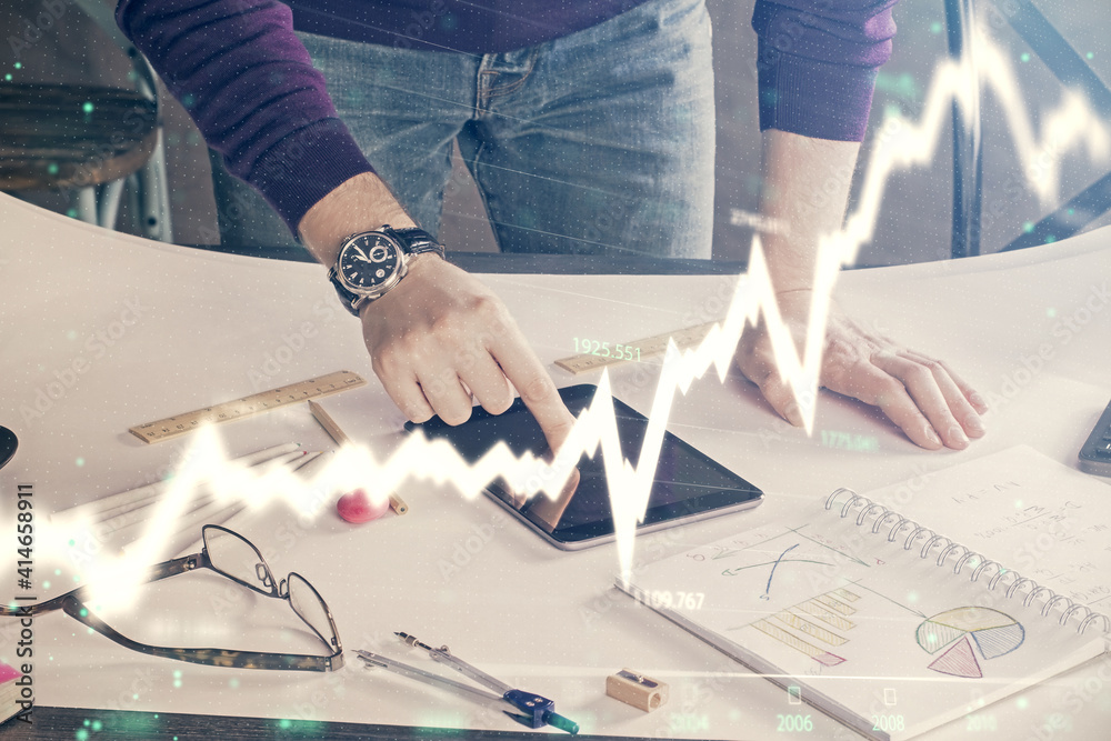 Poster double exposure of man's hands holding and using a digital device and forex graph drawing. financial