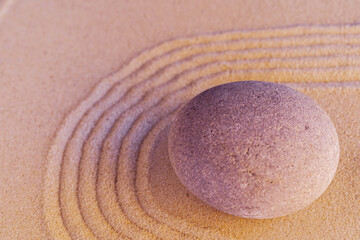 Fototapeta na wymiar Stones on sand, japanese meditation zen garden