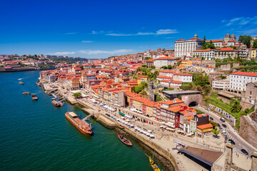 Porto, Portugal. Cityscape. Bairro da Ribeira, iconic neighbourhood seen from high angle on sunlight.