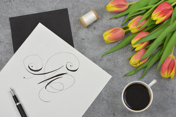 coffee, flowers, tulips, pen and notes, calligraphy