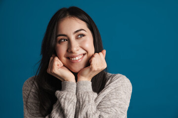 Happy beautiful asian girl smiling and looking aside