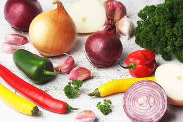 Different spices: onion. garlic, parsley and pepper