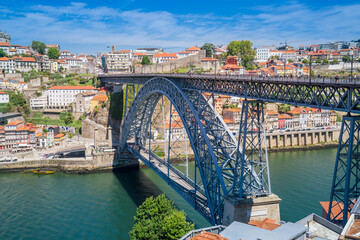 Porto, Portugal. August 23, 2020. View of the bridge Luiz I from Vila Nova de Gaia. In the background of the photo you can see the Bairro da Ribeira of Porto