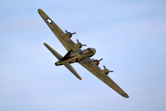 Vintage warbird US Air Force Boeing B-17 Flying Fortress WW2 bomber plane perforing at the Sanice Sunset Airshow. Belgium - September 13, 2019.