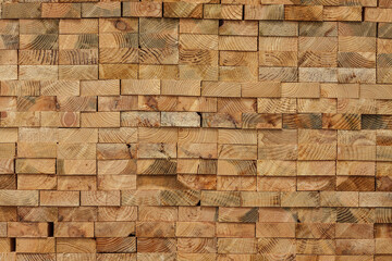 Background of stockpiled wood cutted in rectangular shape