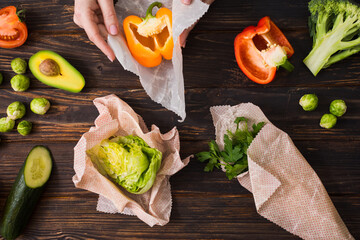 Plastic free kitchen concept. Beeswax wraps with food on them