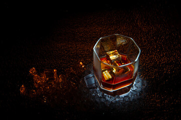 glass of whiskey with ice