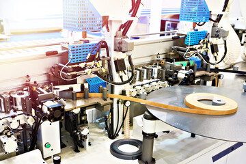 Automatic edge banders on factory