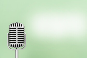 Microphone retro with copy space on greed background
