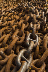 Large iron anchor chain. A rusty chain link. Corrosion. Shackles.