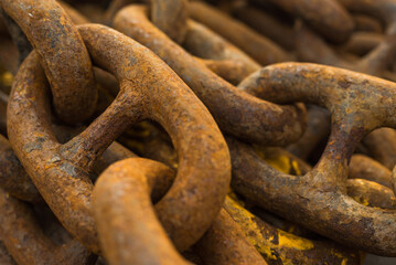 Large iron anchor chain. A rusty chain link. Corrosion. Shackles.