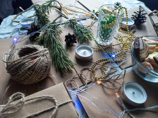 Photo New Year's flat ley. Christmas background.  colorful decorations. new year multi-colored illumination. craft bags