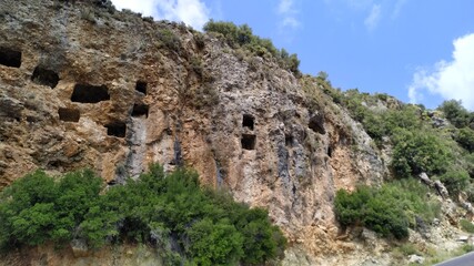 Fototapeta na wymiar Kalkan Islamlar Village Lycian Rock Tombs at location Kas Antalya 