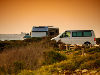 Camper cars on beach sea shore