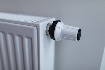 The battery is hanging on the wall. Heating in an apartment, at home. Heating prices.