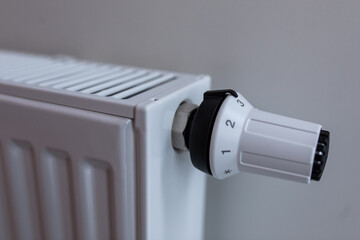 The battery is hanging on the wall. Heating in an apartment, at home. Heating prices.