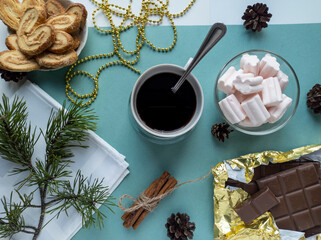 new year's flat lay. green background. top view photo. Christmas decorations, coffee. New year, Christmas, Valentine's day.