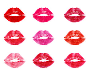 Different lipstick prints of  lips on white background