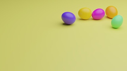 multicolored easter eggs lie on yellow background
