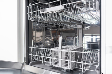 New dishwasher. Built-in dishwasher in kitchen