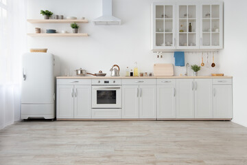 Fototapeta na wymiar Light kitchen in daylight, simply, minimalist scandinavian interior
