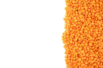 Red lentils isolated on a white background.
