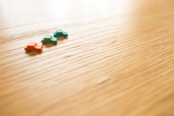 Wooden miniature cars, one of them is different. Difference concept and vehicular safety