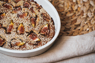 Vegan pie with figs in a ceramic bowl