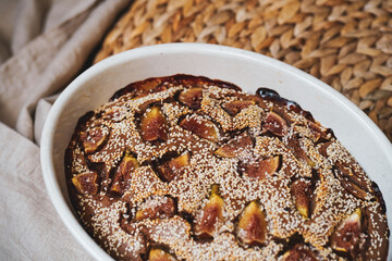Vegan pie with figs in a ceramic bowl