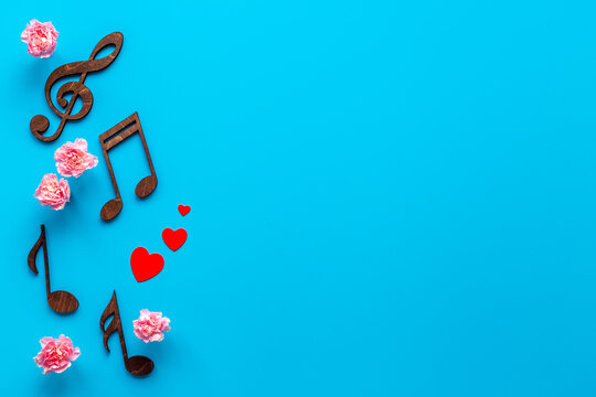 Valentines day music with notes and flowers. Songs of love