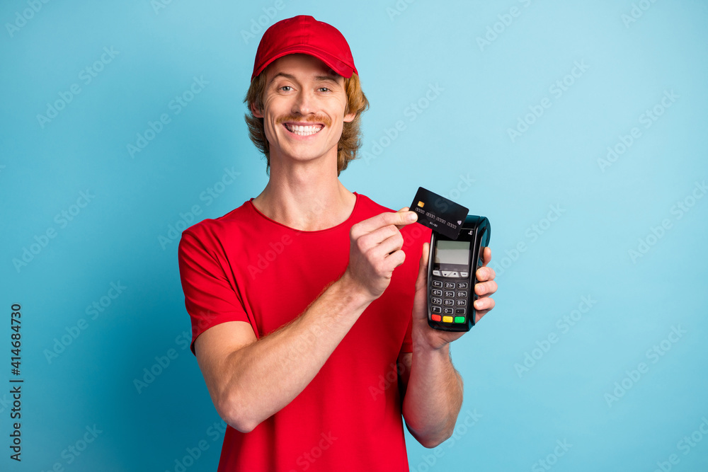 Sticker portrait of positive man hands hold debit card pos terminal toothy smile isolated on blue color back