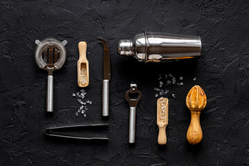 Set of bartender tools and accessories with a cocktail shaker